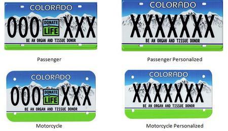 Donate Life License Plate with gradient blue background white mountains and neon green on the bottom featuring the Donate Life logo in the middle
