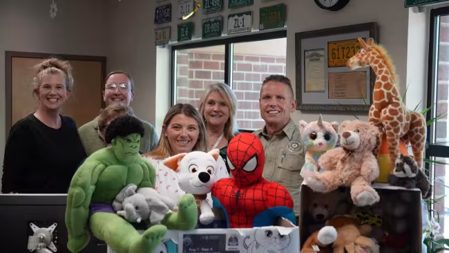 Frisco Driver License Office staff and Sheriff Jamie FitzSimons