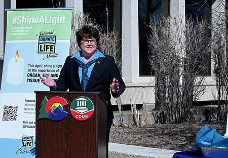 Donate Life Colorado CEO Jennifer Prinz speaks about the important role organ, eye and tissue donation plays in saving Coloradans’ lives on Monday, April 10, 2023, during a flag raising ceremony at CDOR’s main office in Lakewood. The Division of Motor Vehicles and Donate Life Colorado hosted  a flag-raising ceremony to commemorate National Donate Life Month. This ceremony helped bring awareness of what it means to be an organ donor and highlights the partnership between Donate Life Colorado and the Colorado
