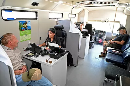 Photo of customers being served inside the DMV2GO RV