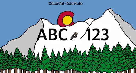 License plate of white capped mountains and evergreen trees in the front. The Colorado logo is a setting sun.