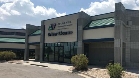 External DMV building showing signage of the Colorado Dept of Revenue Driver License