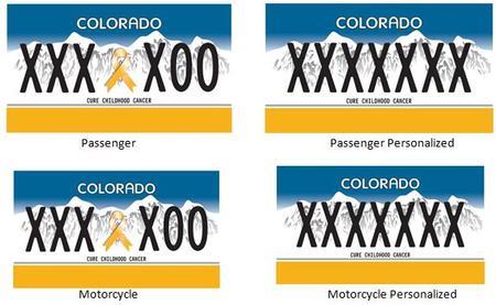 Childhood Cancer Awareness License Plate with blue backdrop white mountains and a strip of yellow on the bottom.