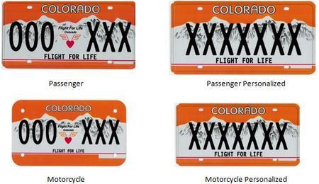 Flight For Life Colorado License Plate with Orange background and white mountains with the Flight For Life Colorado logo in the middle