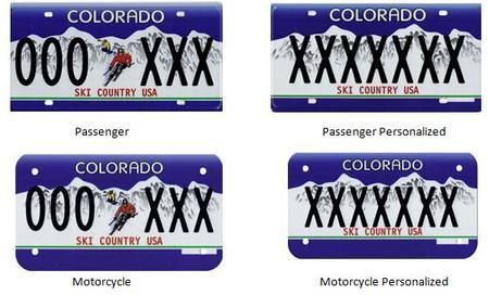 Ski Country USA Colorado License Plate with a Deep blue background and white mountains and a picture of a skier in the middle